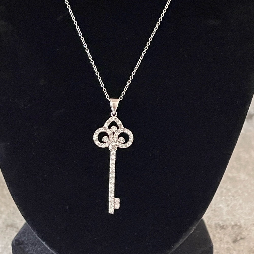 Bella Luce .69CTW Round Rhodium Plated, Sterling Silver Key Pendant 18" Chain